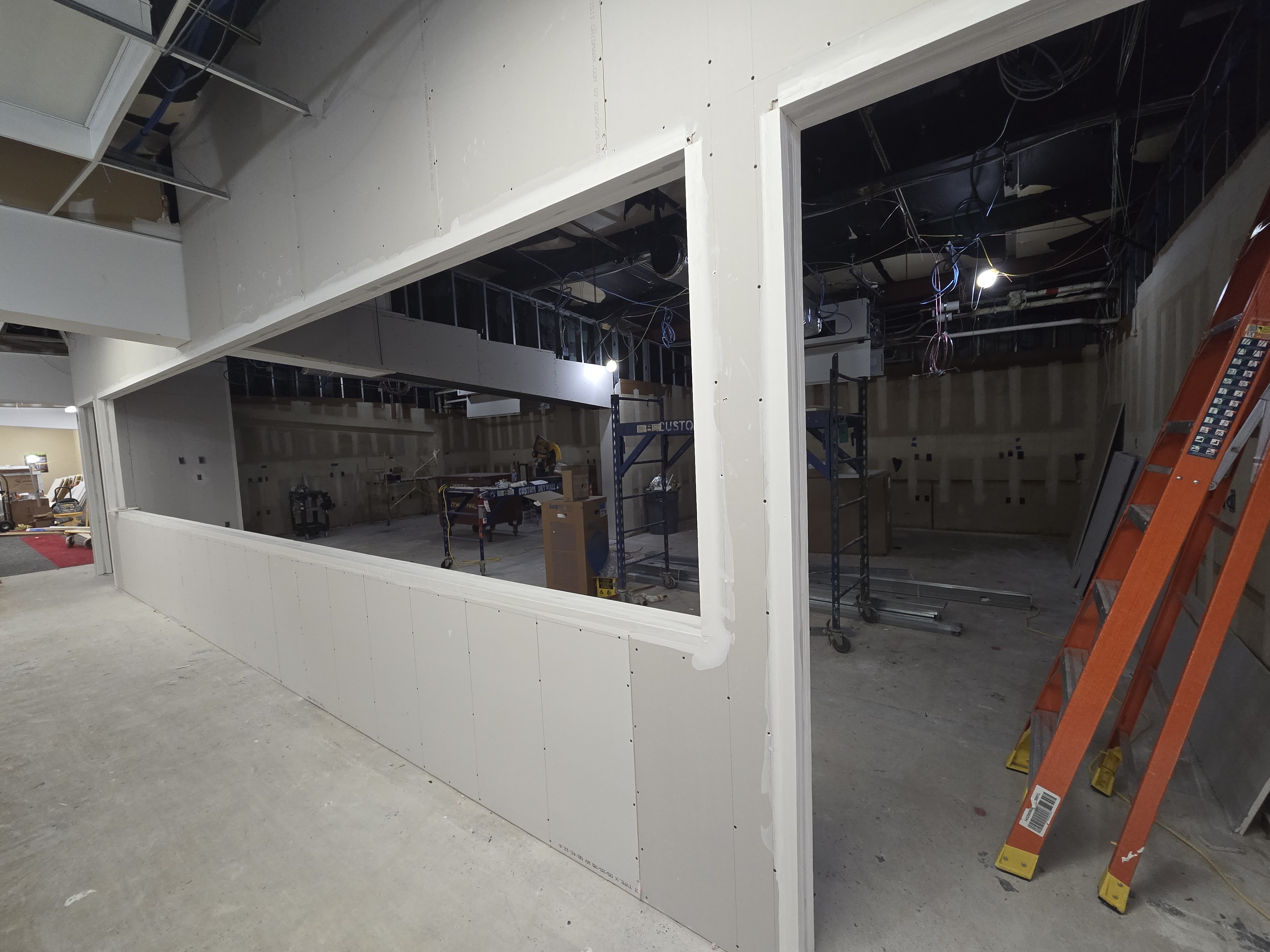 Computer lab area with drywall installed.