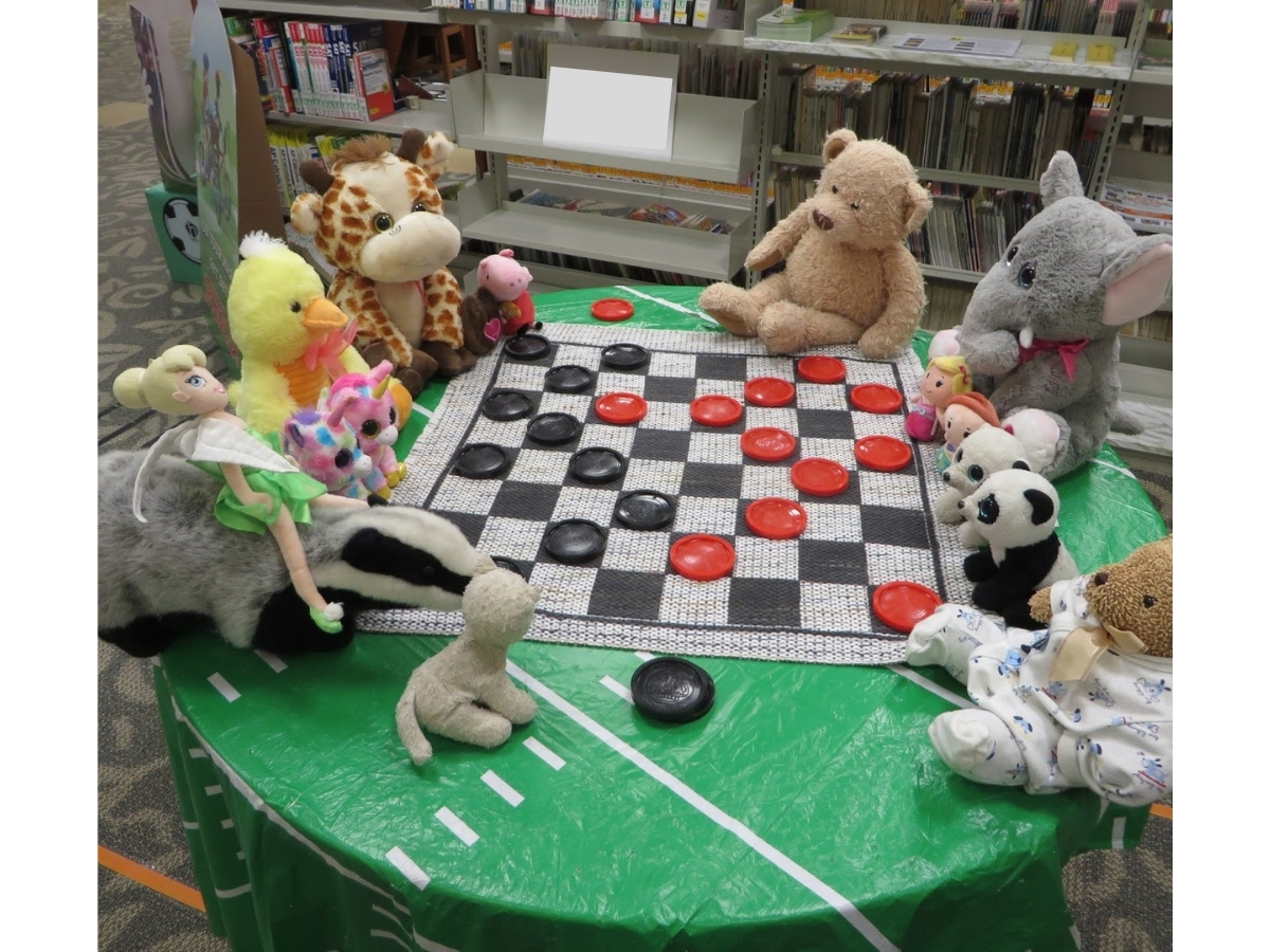 Stuffies playing checkers